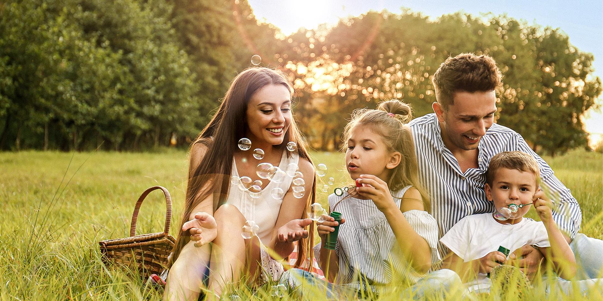Family enjoying a picnic in a field near Stockton, CA